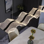 Erik – Dimmable Nordic LED Pendant Light with Creative Long Wave Design for Dining Tables and Bars Kozyled.com